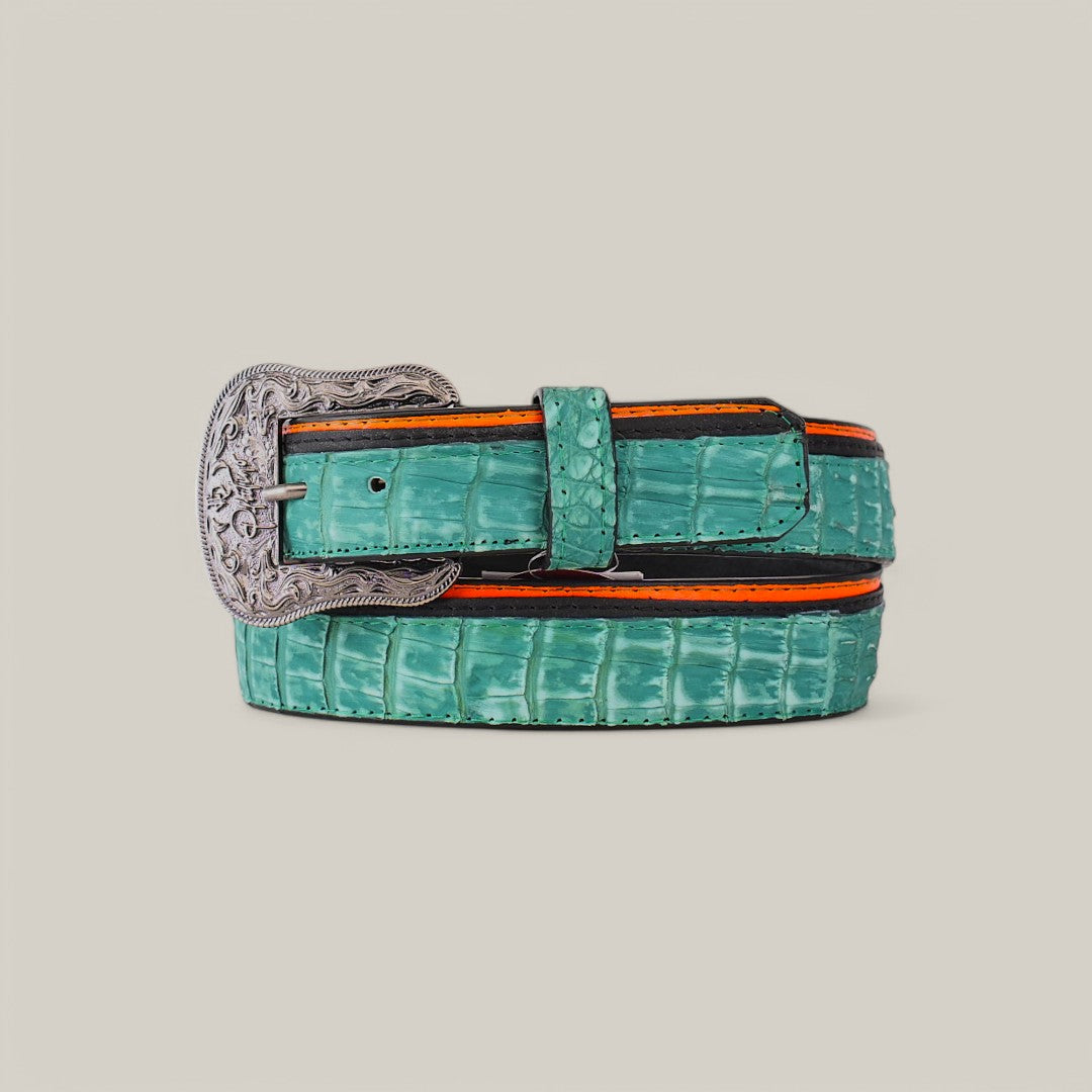 The Exotic Caiman Green Belt features a crocodile pattern and a platinum buckle with intricate designs, complemented by orange and black trim, elegantly presented on a plain background.