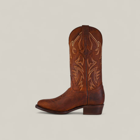 The Dutton - Brick - Roper Toe, a single brown cowhide boot with decorative stitching and a slightly pointed toe, is shown in profile against a plain light background as part of the Last Call collection.