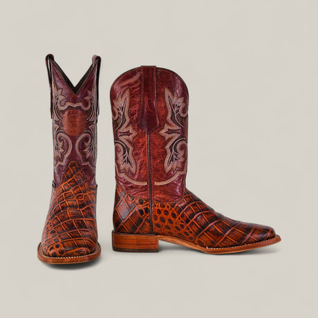The Jonh - Cogñac - Square Toe boots from the Last Call collection feature dark brown crocodile-patterned feet, reddish-brown shafts with white and gray stitching, and are shown from front and side views.