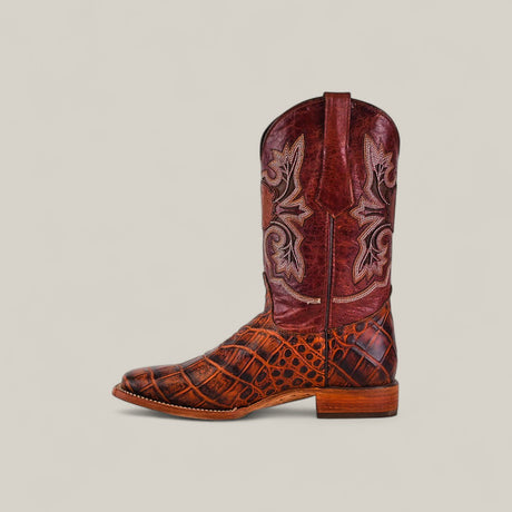 The Jonh - Cogñac - Square Toe boot features a brown cowhide foot with an alligator texture and intricate stitching on a tall, burgundy leather shaft, shown in profile against a plain beige background.