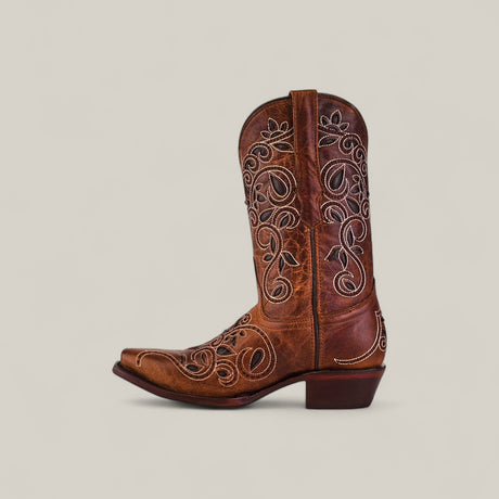 The Gina - Brown - Snip Toe boot features brown cowhide leather, decorative white stitching, a pointed toe, and a short angled heel, shown against a simple light background.