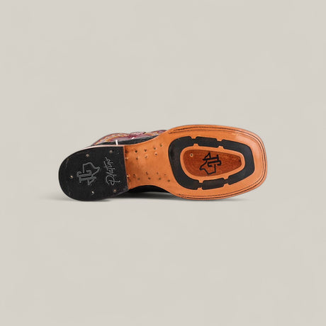 The Exotic Caiman Horn Back - Black - Square Toe is displayed sole-up, showing black rubber grip sections, a square toe design, and signature logos embossed near the heel and center against a plain light background.