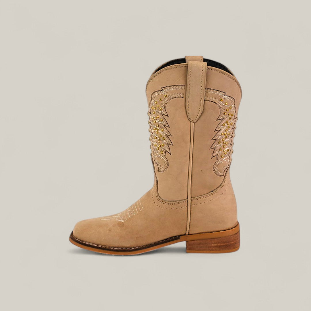 A single Orion Suede Bone - Square Toe kids boot in tan suede with yellow decorative stitching, a rounded toe, and a low wooden heel, displayed in profile against a plain light background.