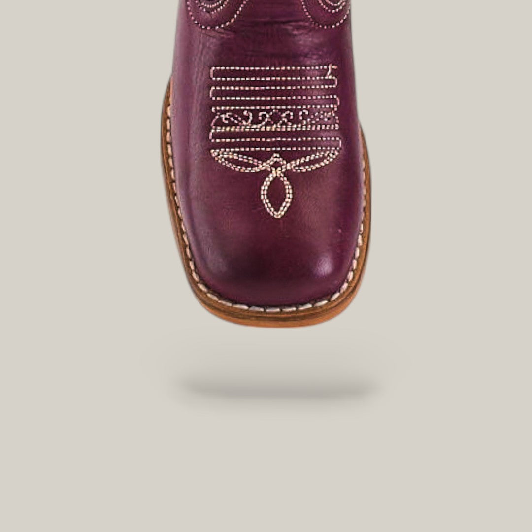 The Blake Purple - Square Toe - Kids Boots are shown from above in maroon, featuring white decorative toe stitching, a brown sole, and a trendy look against a light gray background.