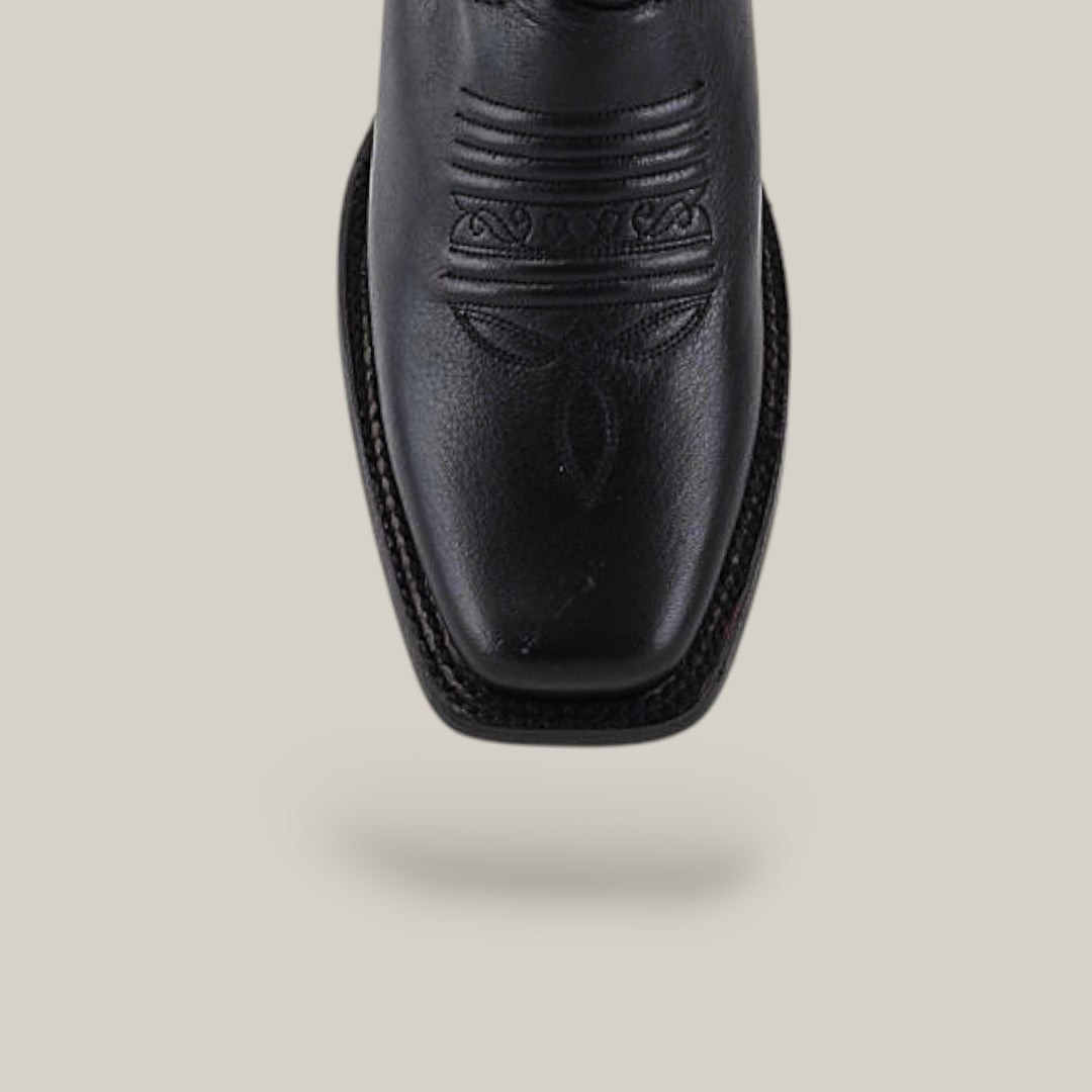 The Josie Full Black - Short Shaft - Narrow Square Toe is a chic black boot with decorative top stitching, shown from above on a light background—ideal for anyone seeking stylish womens boots.