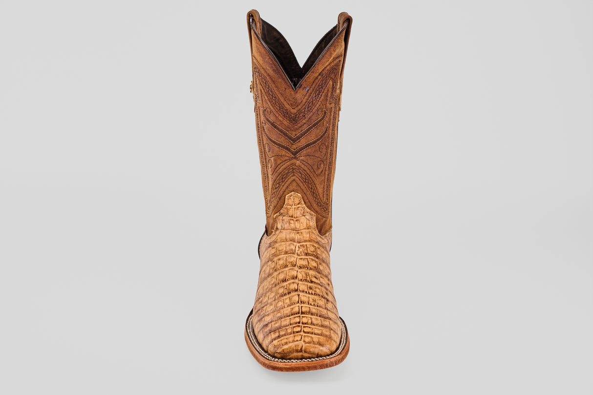 The Exotic Caiman Belly - Antique - Square Toe boot, featuring intricate shaft stitching and a textured alligator-patterned toe, is shown against a plain light gray background.