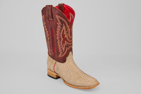 The Braxton - Cappucino - Square Toe is a luxury mens boot with a tan, python-textured lower half and tall, dark red shaft with yellow stitching and pull straps, finished with a wooden heel for timeless Western appeal.