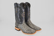 A pair of Exotic Full Quilt Ostrich - Gray - Square Toe boots with black decorative stitching, brown wooden soles, and square toes are displayed side by side on a plain light gray background.
