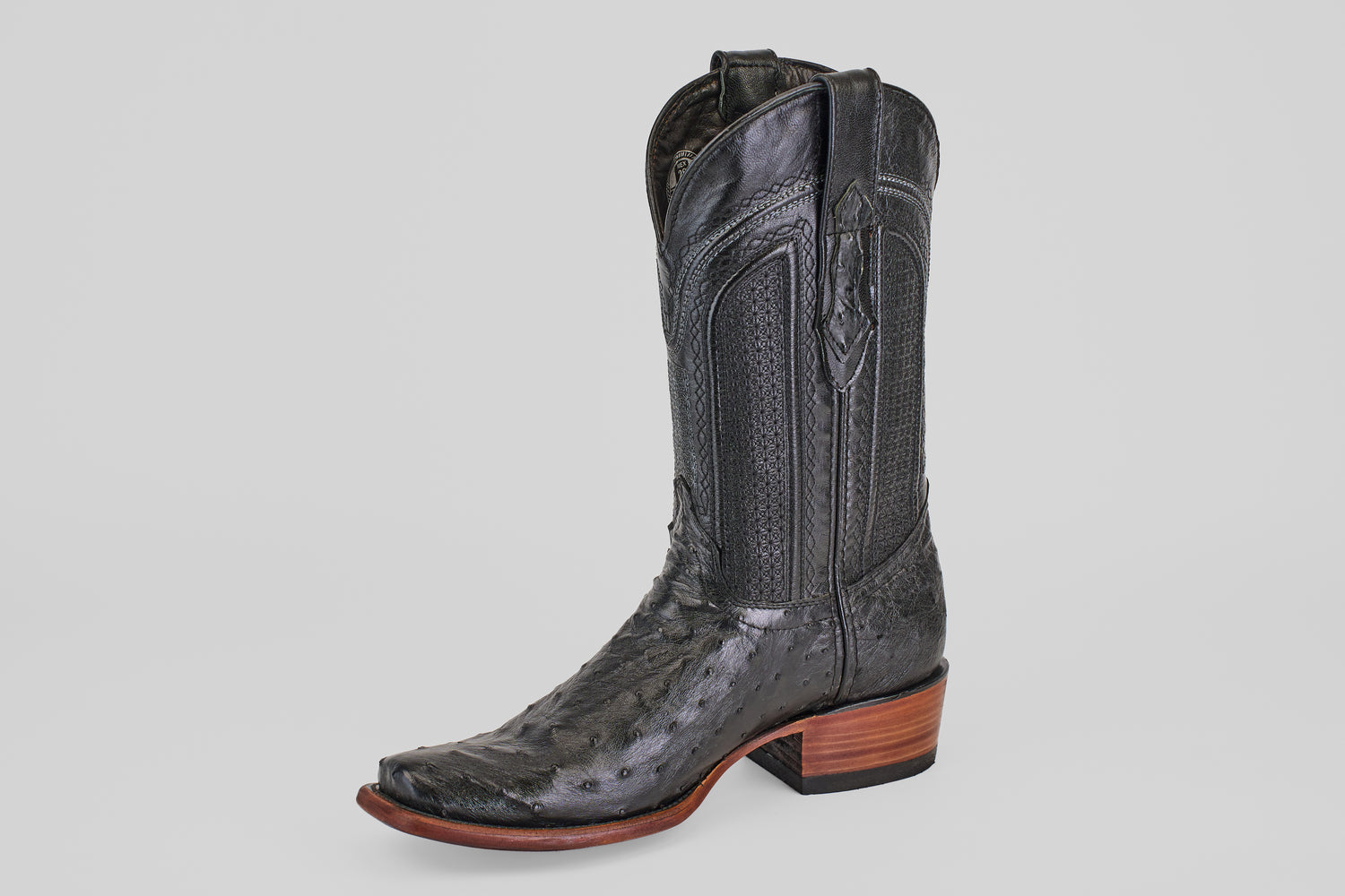 The Exotic Ostrich - Black - Narrow Square Toe boot features decorative stitching, a narrow square toe, and a wooden block heel, displayed against a plain light gray background.