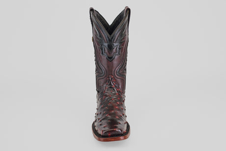 A single Exotic Ostrich - Black Cherry - Rodeo Toe cowboy boot with decorative stitching and a textured leather pattern, photographed from the front against a plain light background.