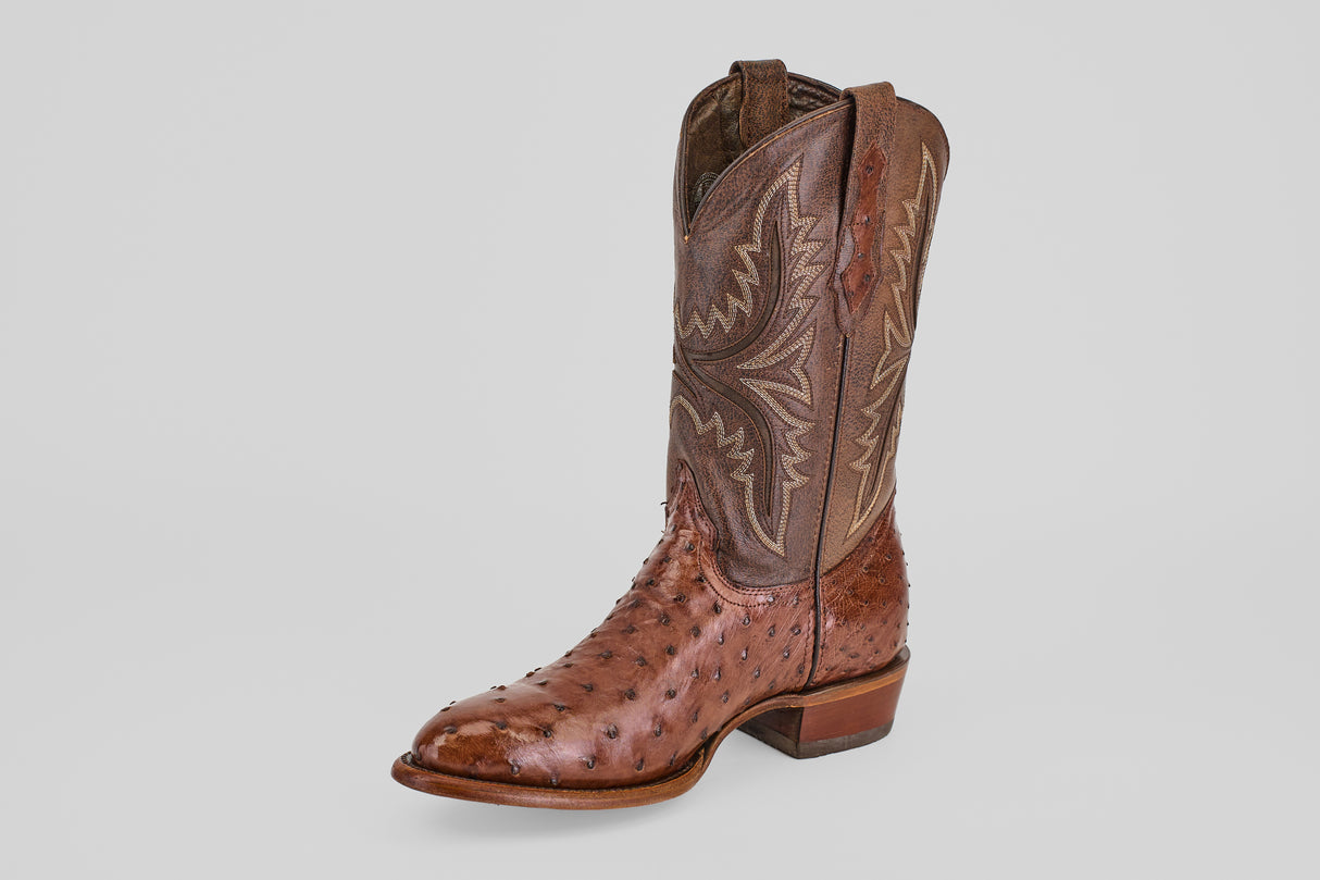 A brown boot called Austin - Brown - Round Toe features a stylish round toe design.