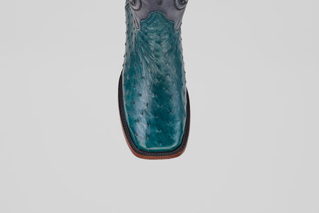 Top view of Austin - Gasoline Green - Square Toe men's western boots made from turquoise ostrich leather with a brown sole, displayed on a white background.