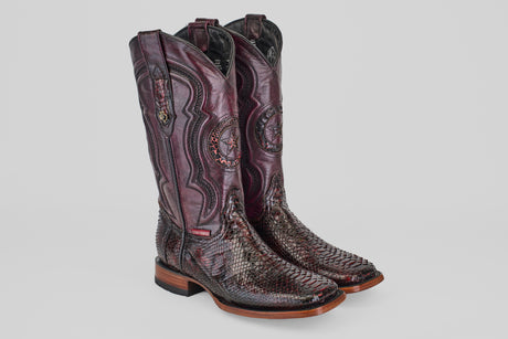 A pair of Tanner - Black Cherry - Square Toe cowboy boots with dark reddish-brown python-textured leather and detailed stitching, shown against a plain light gray background.