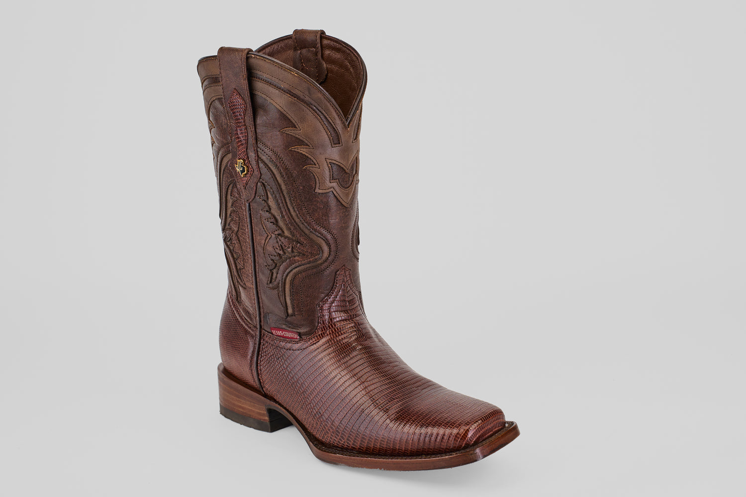 The Blaze – Brown – Rodeo Toe: a single genuine brown lizard leather cowboy boot with decorative stitching and a square toe, showcased on a plain light gray background.