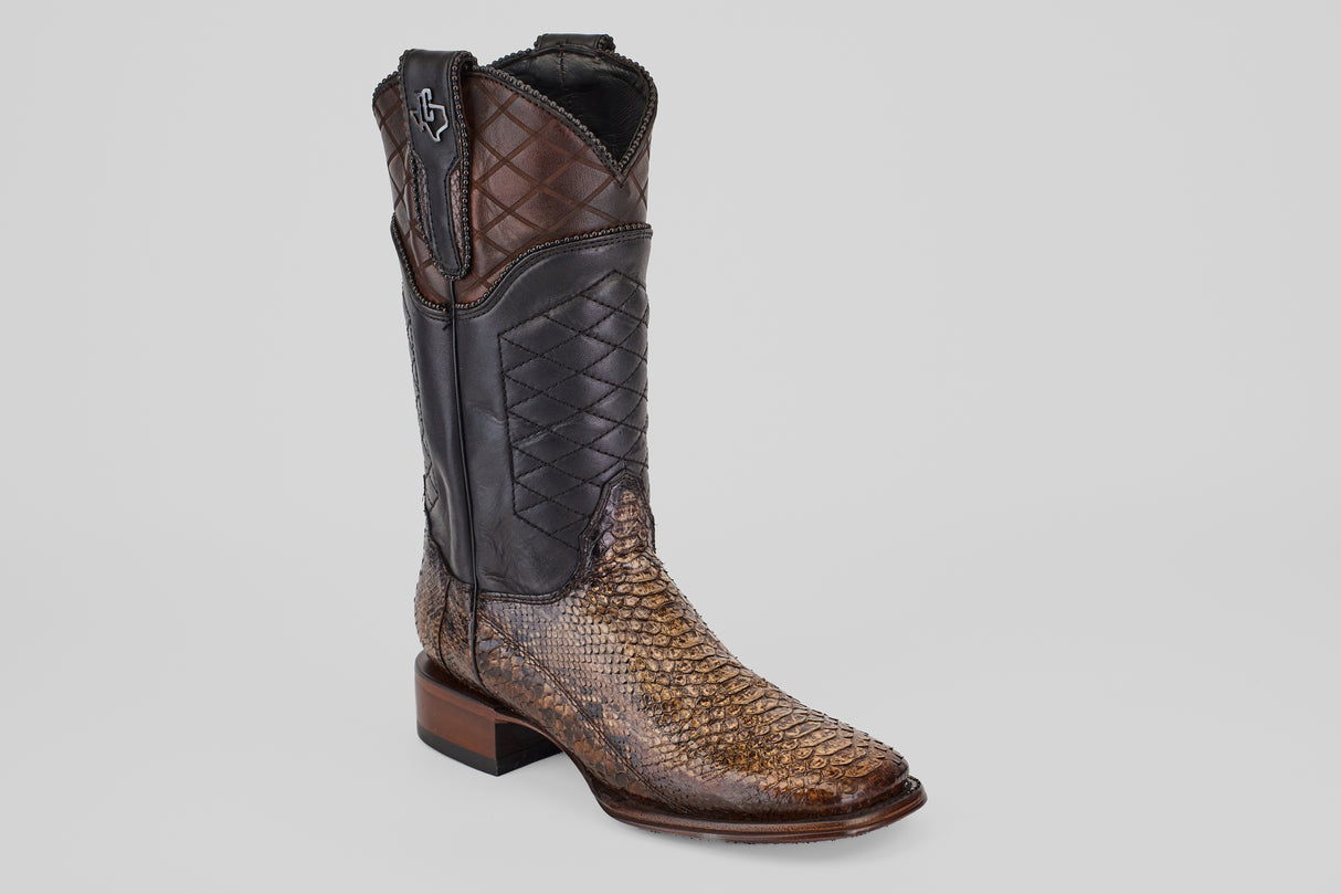 The Tanner Platinum - Dune - Square Toe (Imperial) boot features a textured brown snakeskin foot, black and brown leather shaft with quilted patterns, plus a Texas-shaped emblem—making it a bold, stylish choice among men’s cowboy boots.