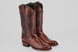 The James Platimun - Dark Cogñac boots feature a roper toe (Diamond), textured alligator-inspired foot, decorative stitching on the shaft, brown color, low heel, and high-calf men's western style.