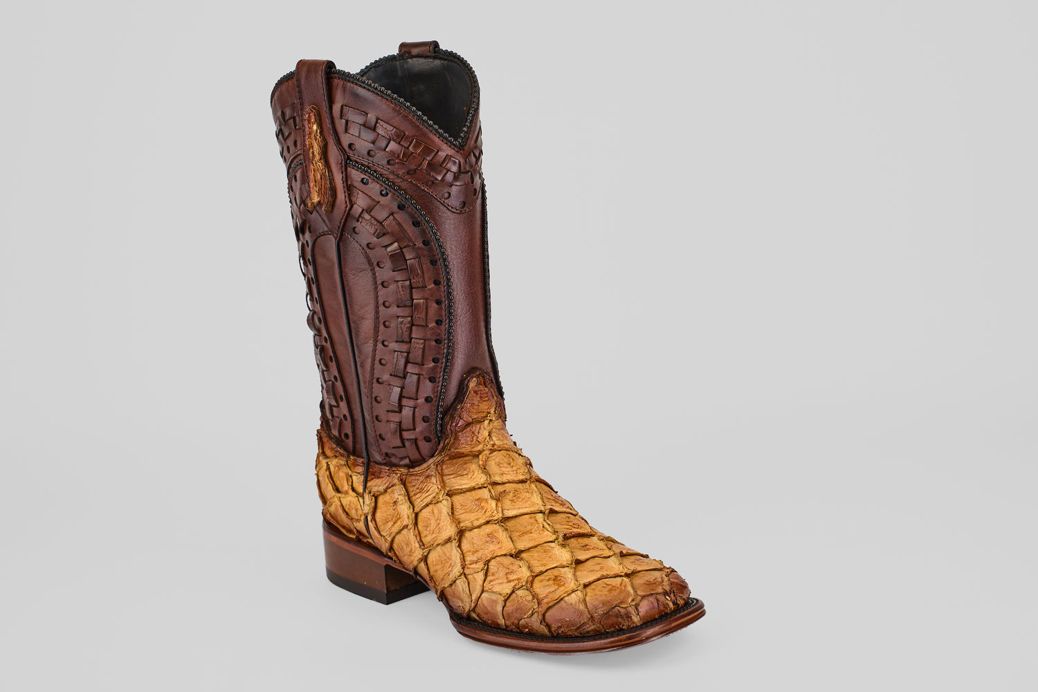 The Conor Platinum - Buttercup - Square Toe (Herradura) cowboy boot features a brown leather upper, textured tan pirarucu-style lower, detailed stitching, and a low wooden heel—a standout men’s western boot.