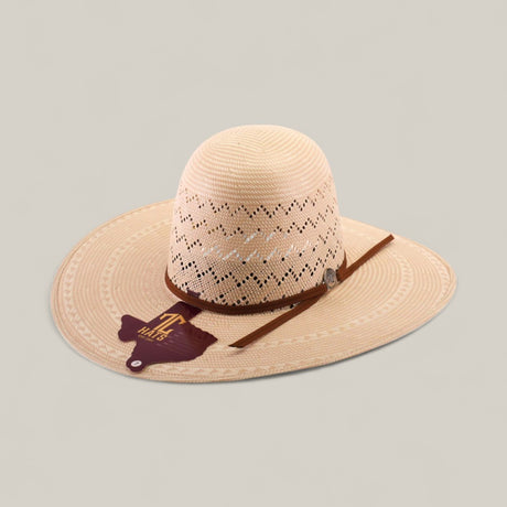 The 30X Zig Zag - Open Crown is a light tan woven straw cowboy hat with unique zig zag cut-out patterns, a brown band, metallic emblem, and Texas A&M University tag—perfect for fans of distinctive hat styles.