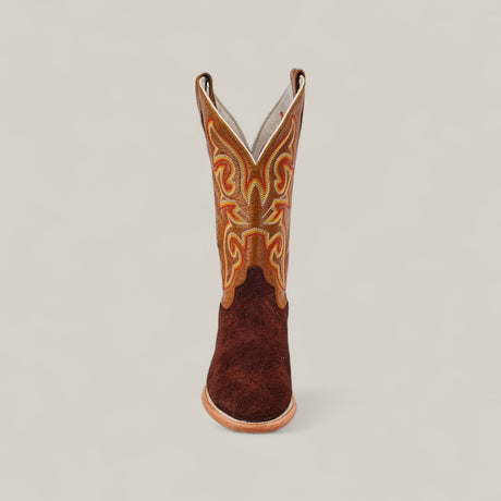 A single Dusty - Classic Brown - Roper Toe boot featuring intricate yellow and orange shaft stitching is shown from the front against a plain light background.