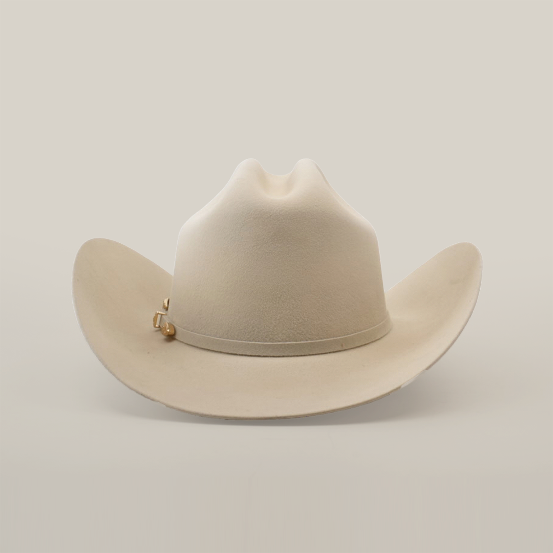 The 5X Dorado Belly, a beige western headpiece crafted from luxurious fur felt, features a wide brim and subtle top crease, evoking the classic style of Larry Mahan 5X against a plain white background.