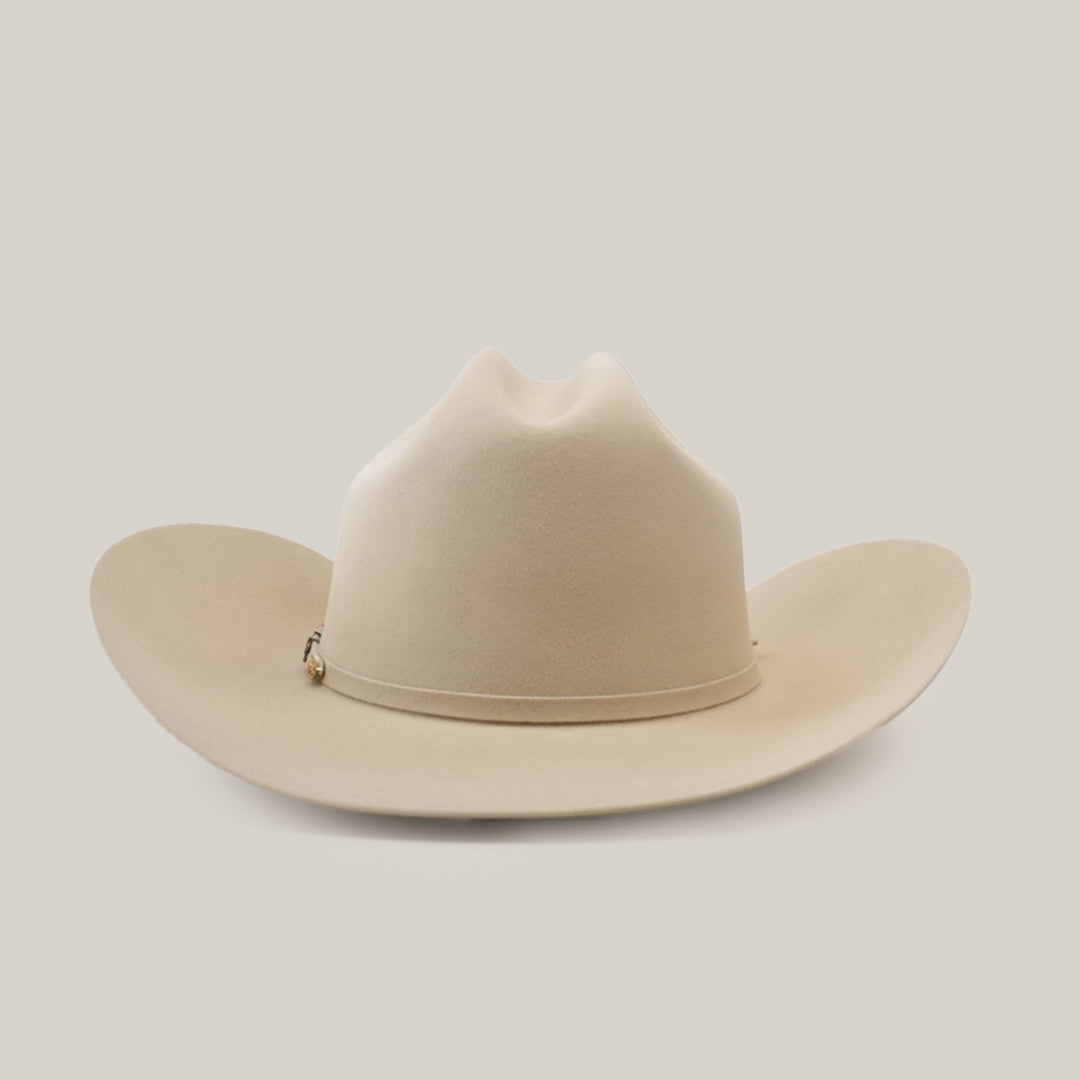 The 500X Superior Belly is a premium Western cowboy hat in light tan, crafted from 100% belly beaver fur. It features a wide brim and a teardrop-shaped crown, set against a plain white background.