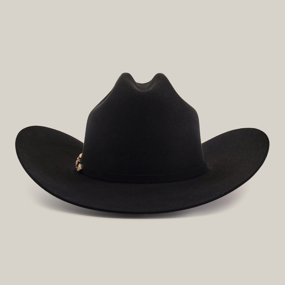 The 500X Superior Black is a luxury cowboy hat with a wide brim and a gold decorative band, embodying the elegance and tradition of premium Western headwear.