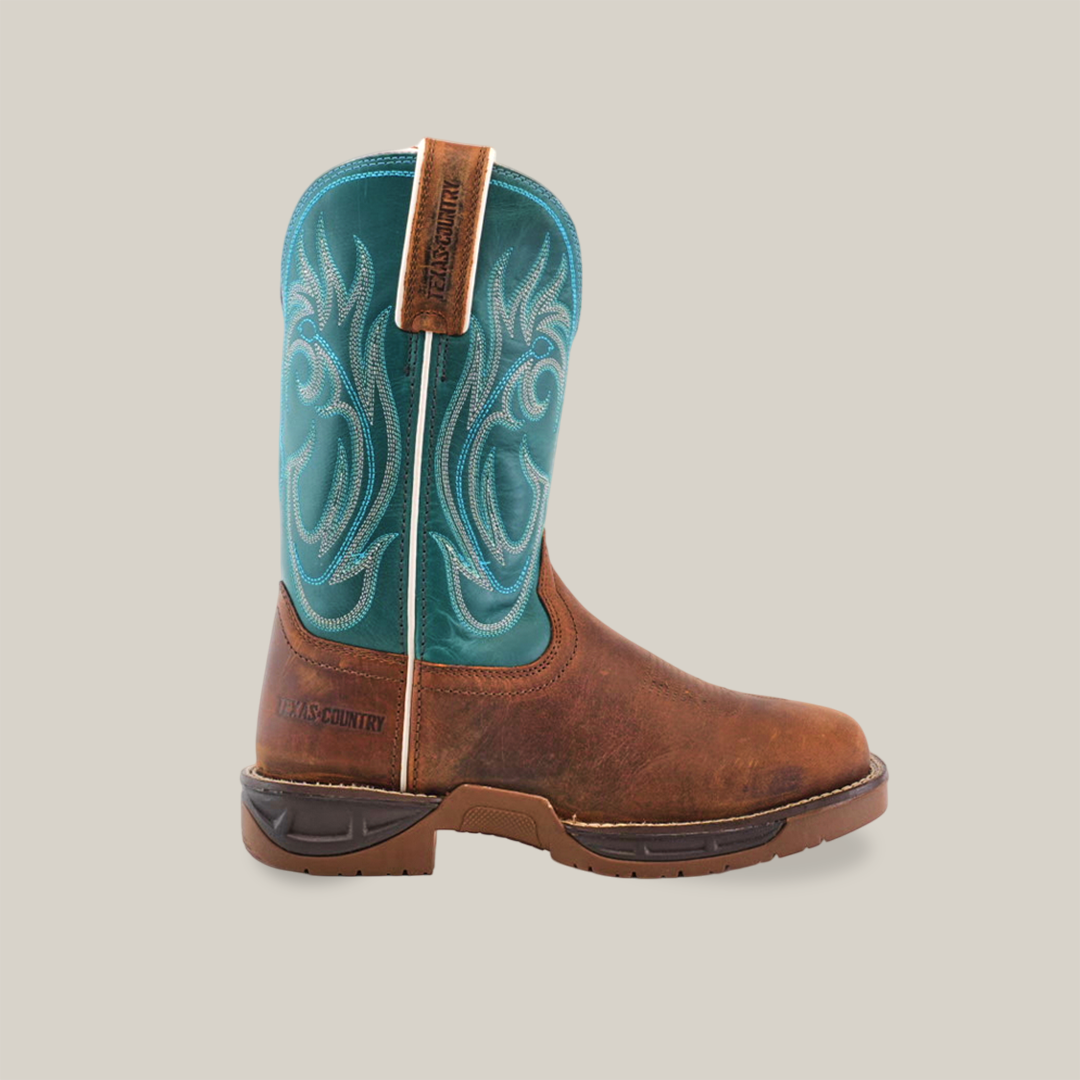 The Rustic Turquoise Brown boots, made from premium cowhide leather, feature intricate embroidery on the shaft and a decorative western-style pattern. They have pull loops labeled DOCS COUNTRY, a sturdy rubber sole, are handcrafted, brown with teal blue elements, and waterproof with a soft toe.