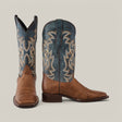 Introducing the Sierra Cinnamon - Square Toe, showcasing Western style through premium leather craftsmanship. With brown leather feet and teal shafts featuring intricate tan and white stitching, the left boot stands forward while the right displays a captivating side view.