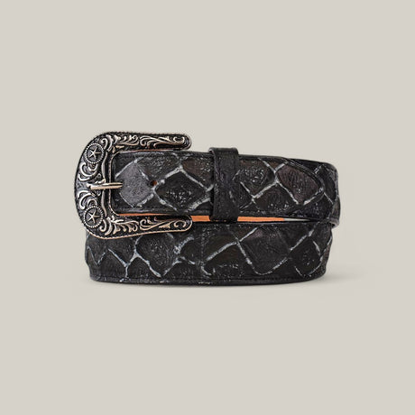 The Pirarucu Print Rustic Black belt features an embossed diamond pattern and an ornate silver Texas buckle with intricate designs, coiled neatly on a neutral background for added rustic charm.