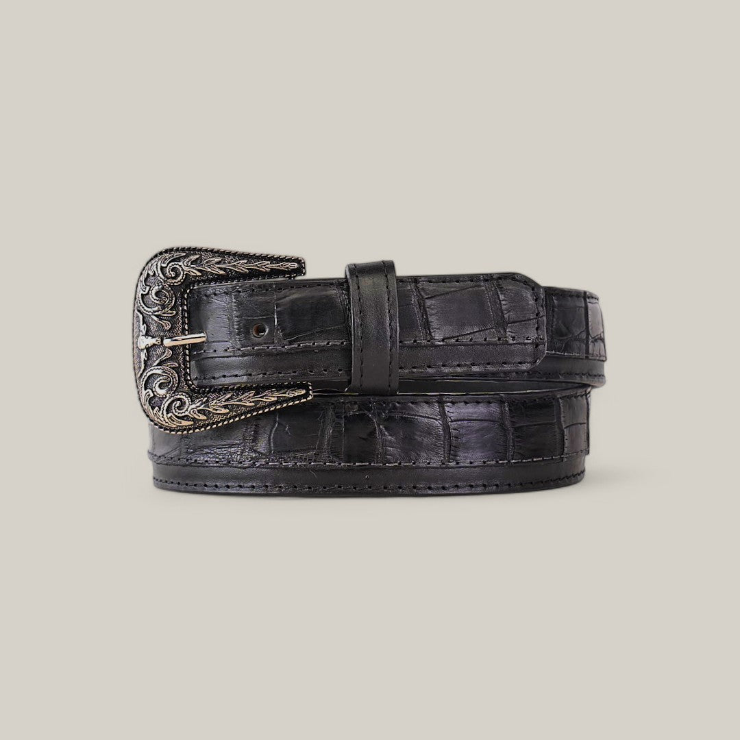 The Exotic Full Quilt Alligator - Platinum Buckle - Black Belt showcases a luxurious crocodile pattern, featuring an ornate silver-colored buckle with intricate circular leaf designs on a plain light gray background.