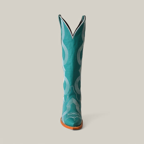 The Olimpia Green Teel boot, crafted from premium materials, features intricate white stitching, a snip toe, and a wooden heel. This tall shaft cowboy boot stands proudly against a plain light background, showcasing its artistry and meticulous attention to detail.