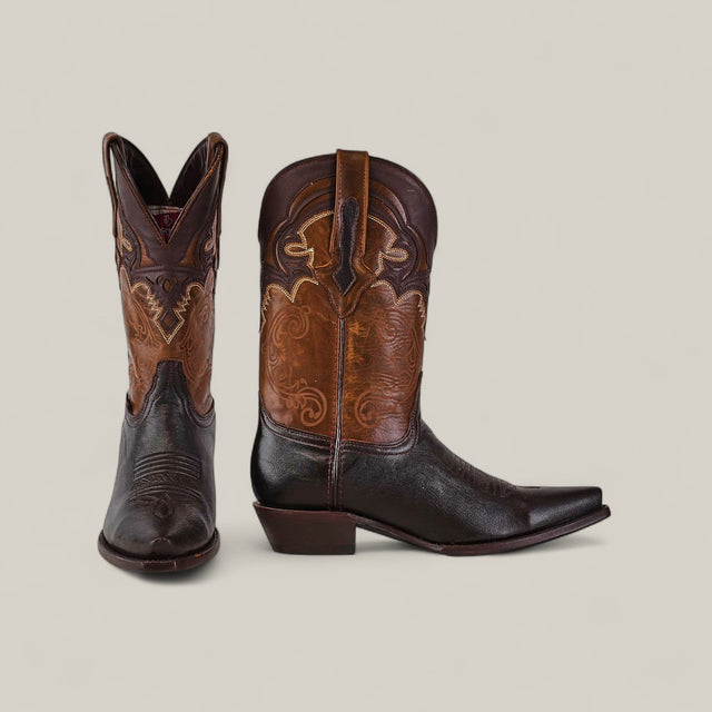 The Rush - Brown - Snip Toe boots feature dark brown feet with lighter, intricately stitched uppers. One boot is shown facing forward and the other in profile, highlighting the classic silhouette and distinct heel.