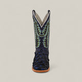 The Exotic Pirarucu Fish - Navy Black - Square Toe boot features a black, scale-textured foot and tall shaft with detailed green and blue stitching, displayed on a light background as part of the luxury Platinum Collection.