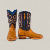 A pair of Exotic Full Quilt Ostrich Fawn Kids Boots featuring decorative stitching, a square toe, blue lining, and textured ostrich leather on the foot, showcased on a neutral background for classic Western style.
