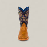 The Exotic Full Quilt Ostrich Fawn - Square Toe - Kids Boot features a fawn ostrich foot, dark blue shaft, and colorful embroidery, displayed from the front against a plain light background.