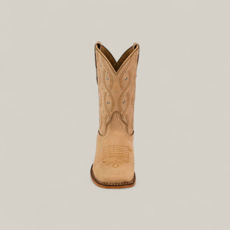 The Premiere Suede Bone - Square Toe - Kids boots feature tan suede, decorative stitching, and small silver studs, displayed upright and facing forward against a plain light background.