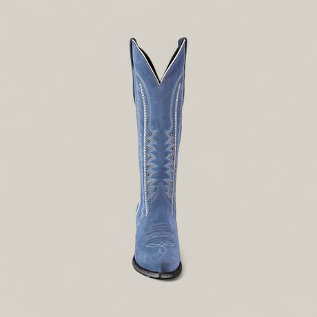 The Elizabeth Light Blue - Tall Shaft - Snip Toe boot is shown standing upright on a plain background, featuring white decorative stitching and a stylish design that makes a bold statement for women.