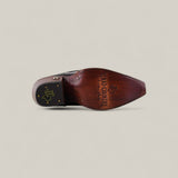 A single Kellie Clayton Black Leather Sole - Tall Shaft - Snip Toe boot is shown from the sole, featuring a brown wooden finish with Texas Country branding and a gold logo near the heel on a neutral background.