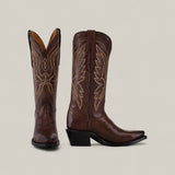 The Miranda Clayton Brownie Leather Sole boots feature brown leather, yellow stitching, snip toes, angled heels, and a mid shaft. One boot faces forward and the other is shown from the side against a light plain background.