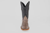 The Exotic Caiman Horn Back - Serpentine - Square Toe boot is shown from the front, displaying a textured reptile-like lower, dark stitched shaft, and light brown sole—a classic western look against a plain background.