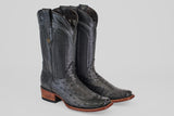 The Exotic Ostrich - Black - Narrow Square Toe boots feature textured ostrich leather, decorative stitching, wooden heels, and a narrow square toe, displayed against a plain light gray background.