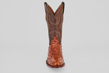 A single Exotic Full Quilt Ostrich - Brandy - Round Toe cowboy boot in brown, handcrafted with decorative stitching and a shiny quilted ostrich leather finish, shown from the front against a plain light background.