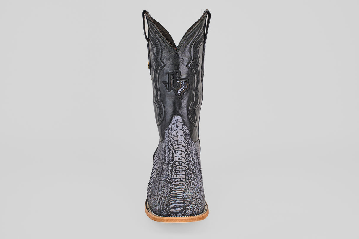 The Austin Leg - Blue Jean - Square Toe men's cowboy boot features a textured, reptile-like pattern and a light brown sole, displayed from the front against a white background—ideal for matching with blue jeans.