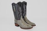 The Austin - Oxford - Round Toe men's cowboy boots feature gray and black ostrich leather, decorative stitching, brown soles, and a round toe design, displayed on a plain white background.