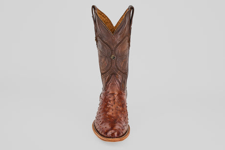 The Austin - Tabaco - Roper Toe is a men's cowboy boot made of textured ostrich leather, shown upright with a classic roper toe on a plain white background.