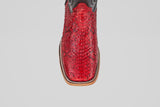 A close-up, top-down view of the Tanner - Ruby - Square Toe cowboy boot highlights its bold red snakeskin, square toe, and decorative stitching along the edge.