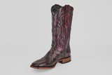 The Tanner - Black Cherry - Square Toe cowboy boot features intricate stitching and a textured reptile-like pattern, with a square toe and low wooden heel, shown singly against a plain light background.