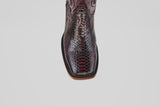 A top-down view of a single, square-toe, dark brown snakeskin cowboy boot—Tanner - Black Cherry - Square Toe—on a plain white background.