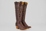 A pair of Allison Dark Moka - Tall Shaft - Snip Toe women's cowboy boots in dark mocha leather with intricate stitching, angled heels, and snip toes stand upright on a light gray background.