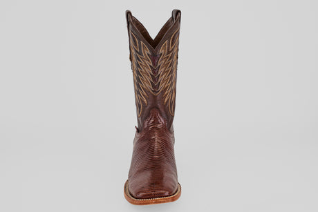 A single Blaze – Brown – Square Toe boot is displayed facing forward on a plain light gray background, highlighting its classic western design and decorative stitching.